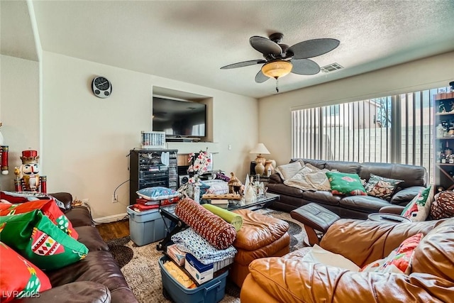 4832 Englewood Ave, Las Vegas, NV 89139 - living room with wood finished floors, ceiling fan, and baseboards
