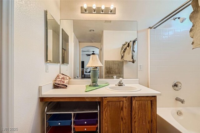 4832 Englewood Ave, Las Vegas, NV 89139 - bathroom with washtub / shower combination and vanity