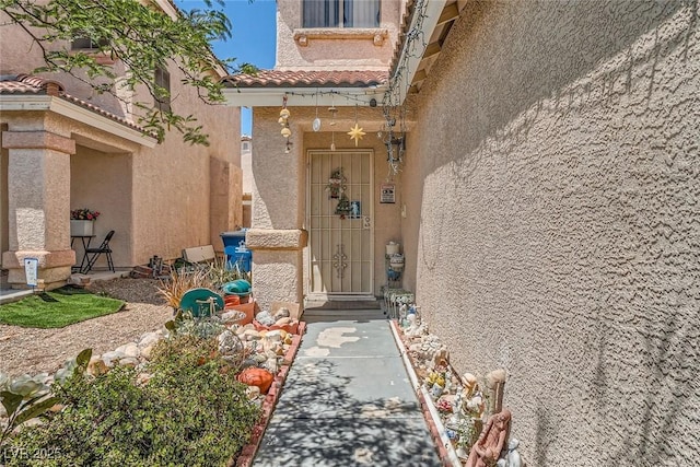 4832 Englewood Ave, Las Vegas, NV 89139 - property entrance featuring stucco siding and a tile roof