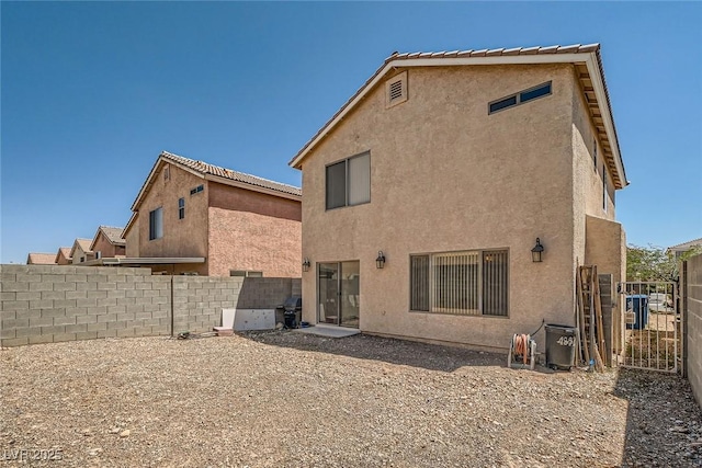 4832 Englewood Ave, Las Vegas, NV 89139 - back of property with stucco siding and a fenced backyard