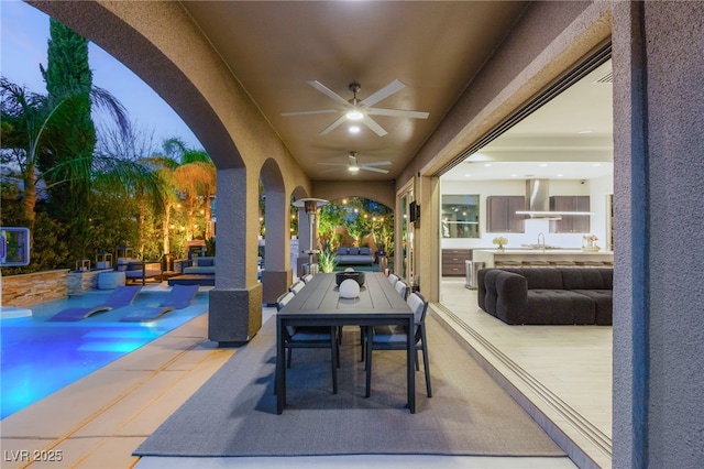 2240 Boutique Ave, Henderson, NV 89044 - view of patio featuring a sink, an outdoor living space, a ceiling fan, and an outdoor pool
