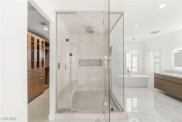 2240 Boutique Ave, Henderson, NV 89044 - full bathroom with a stall shower, vanity, a soaking tub, and recessed lighting