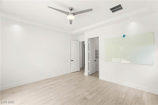 2240 Boutique Ave, Henderson, NV 89044 - empty room with light wood-style floors, ceiling fan, and baseboards