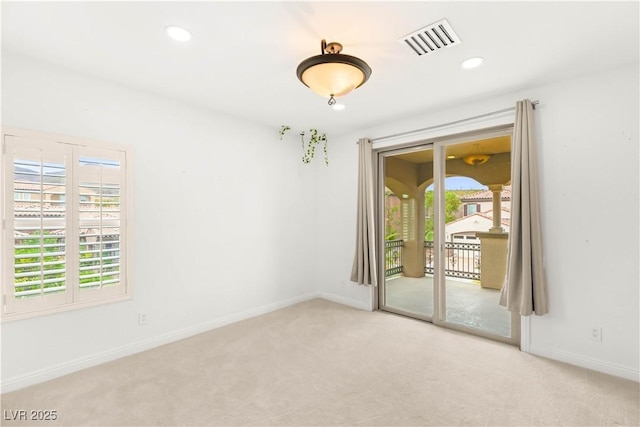 2240 Boutique Ave, Henderson, NV 89044 - carpeted spare room with baseboards and recessed lighting