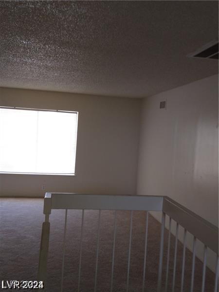 4760 Woodridge Rd, Las Vegas, NV 89121 - unfurnished room with carpet flooring