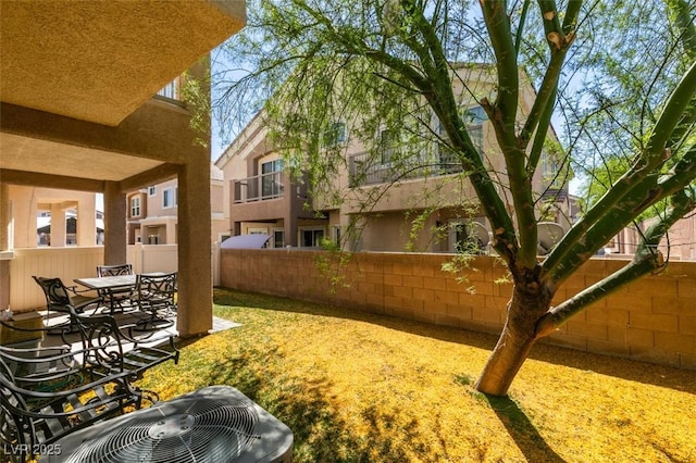5509 Ante Up Ct Unit 102, Las Vegas, NV 89122 - fenced backyard featuring cooling unit and a patio area