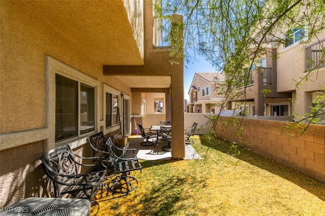 5509 Ante Up Ct Unit 102, Las Vegas, NV 89122 - view of yard featuring a patio area