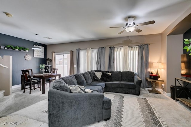 5509 Ante Up Ct Unit 102, Las Vegas, NV 89122 - carpeted living room with ceiling fan and baseboards
