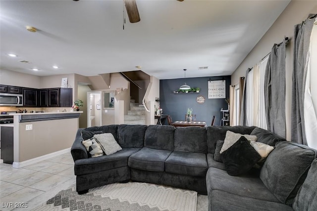 5509 Ante Up Ct Unit 102, Las Vegas, NV 89122 - living area featuring stairs and a ceiling fan