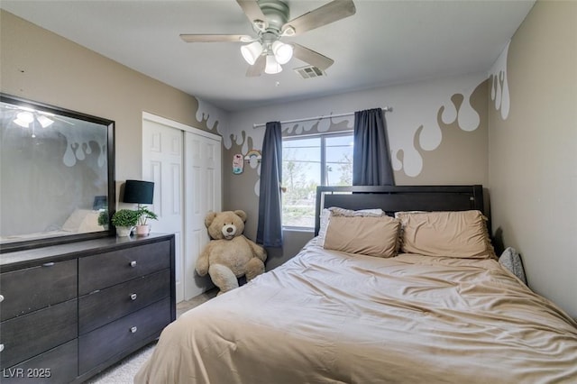 5509 Ante Up Ct Unit 102, Las Vegas, NV 89122 - bedroom with a closet, ceiling fan, and light colored carpet