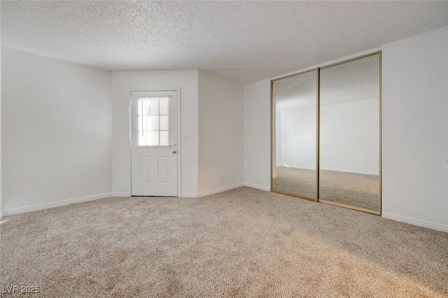 1850 Camino Verde Ln, Las Vegas, NV 89119 - unfurnished bedroom featuring carpet floors, a textured ceiling, and a closet