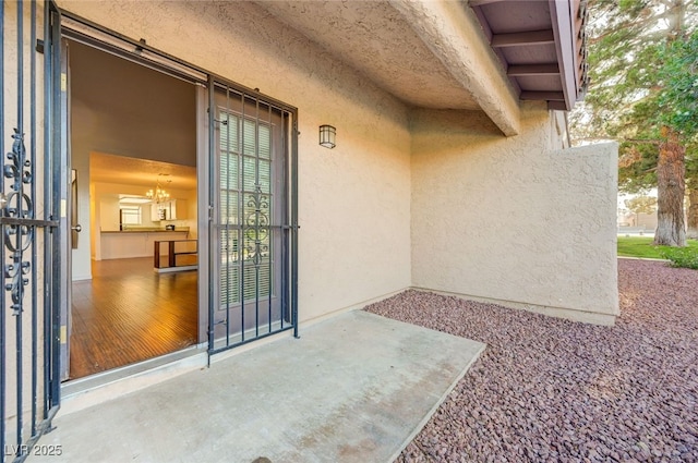 1850 Camino Verde Ln, Las Vegas, NV 89119 - entrance to property with stucco siding and a patio area