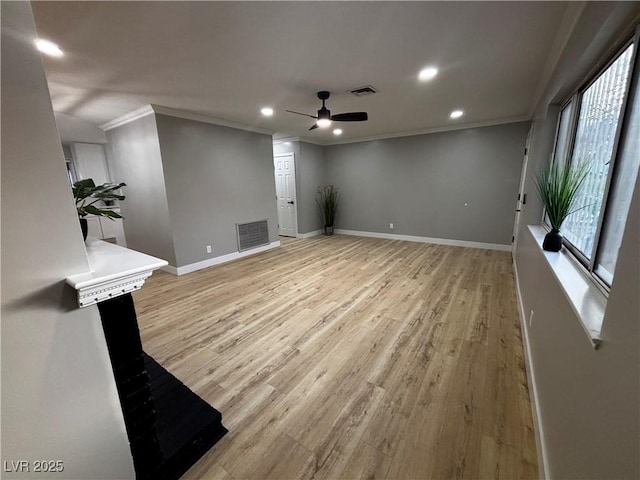 150 Greenbriar Townhouse Way, Las Vegas, NV 89121 - unfurnished living room featuring ornamental molding, a ceiling fan, recessed lighting, light wood-type flooring, and baseboards