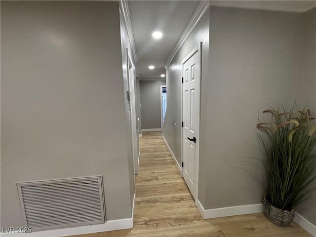 150 Greenbriar Townhouse Way, Las Vegas, NV 89121 - corridor with ornamental molding, light wood finished floors, baseboards, and recessed lighting