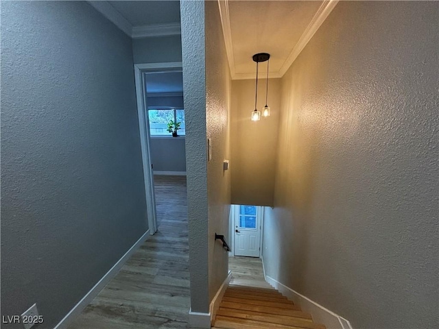 150 Greenbriar Townhouse Way, Las Vegas, NV 89121 - stairs featuring crown molding, wood finished floors, a textured wall, and baseboards