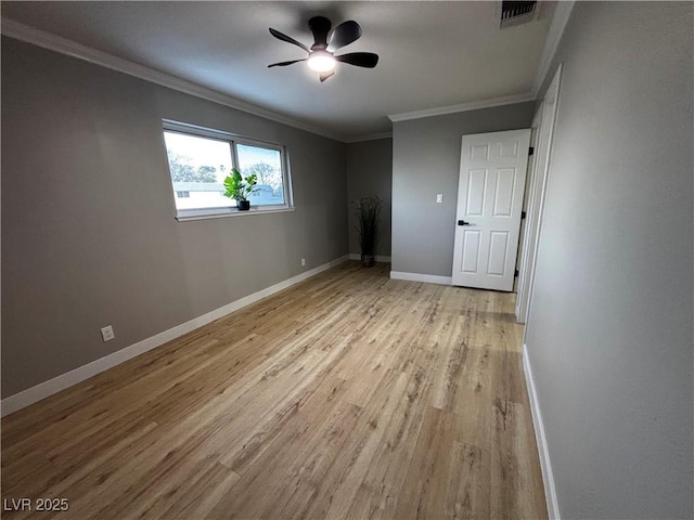 150 Greenbriar Townhouse Way, Las Vegas, NV 89121 - unfurnished bedroom with light wood finished floors, ornamental molding, baseboards, and a ceiling fan