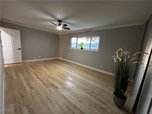 150 Greenbriar Townhouse Way, Las Vegas, NV 89121 - unfurnished room with ornamental molding, light wood-type flooring, baseboards, and ceiling fan