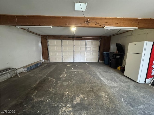 150 Greenbriar Townhouse Way, Las Vegas, NV 89121 - garage with freestanding refrigerator