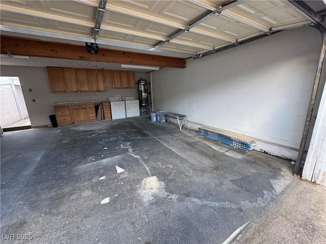 150 Greenbriar Townhouse Way, Las Vegas, NV 89121 - garage with washer and dryer, electric water heater, and a garage door opener