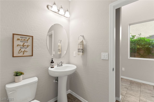 11847 Corenzio Ave, Las Vegas, NV 89138 - half bathroom featuring toilet and tile patterned flooring