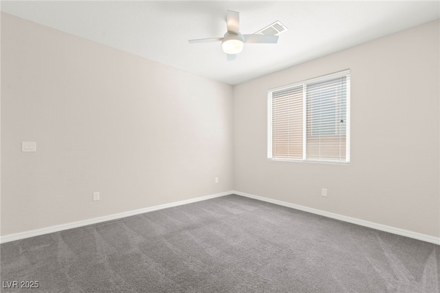11847 Corenzio Ave, Las Vegas, NV 89138 - spare room featuring dark carpet, baseboards, and ceiling fan