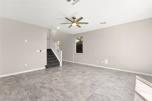 11847 Corenzio Ave, Las Vegas, NV 89138 - spare room featuring stairs, ceiling fan, baseboards, marble look tile flooring, and recessed lighting