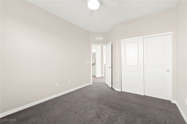 11847 Corenzio Ave, Las Vegas, NV 89138 - unfurnished bedroom with dark colored carpet, baseboards, a closet, and a ceiling fan