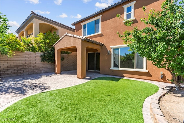 11847 Corenzio Ave, Las Vegas, NV 89138 - back of house with a patio, stucco siding, and a tiled roof