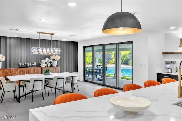 3189 Montecito Dr, Las Vegas, NV 89120 - dining area featuring recessed lighting and a chandelier