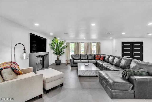 3189 Montecito Dr, Las Vegas, NV 89120 - living area featuring recessed lighting and finished concrete flooring