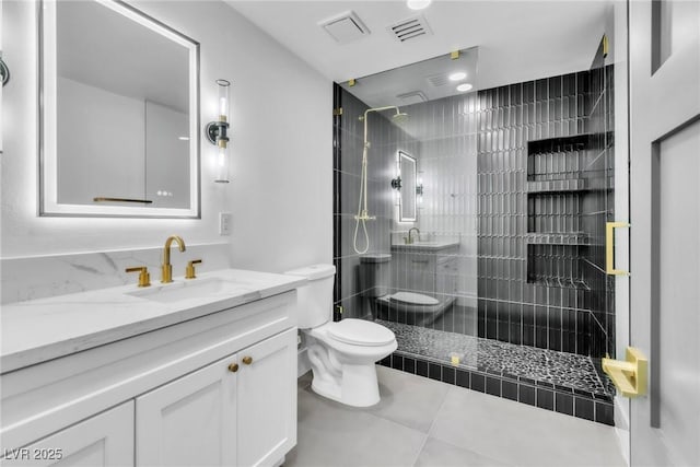 3189 Montecito Dr, Las Vegas, NV 89120 - full bath with toilet, a tile shower, vanity, and tile patterned floors