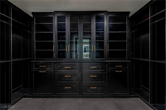 3189 Montecito Dr, Las Vegas, NV 89120 - spacious closet with tile patterned flooring