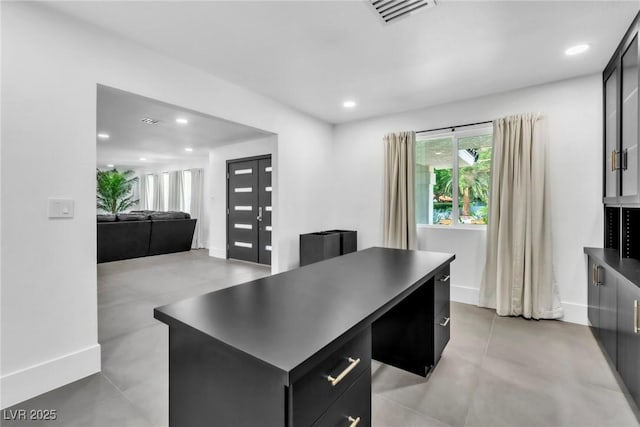 3189 Montecito Dr, Las Vegas, NV 89120 - home office with recessed lighting, concrete flooring, and baseboards
