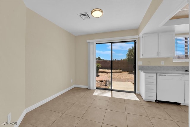 542 Grimsby Ave, Henderson, NV 89014 - unfurnished dining area featuring baseboards and light tile patterned flooring