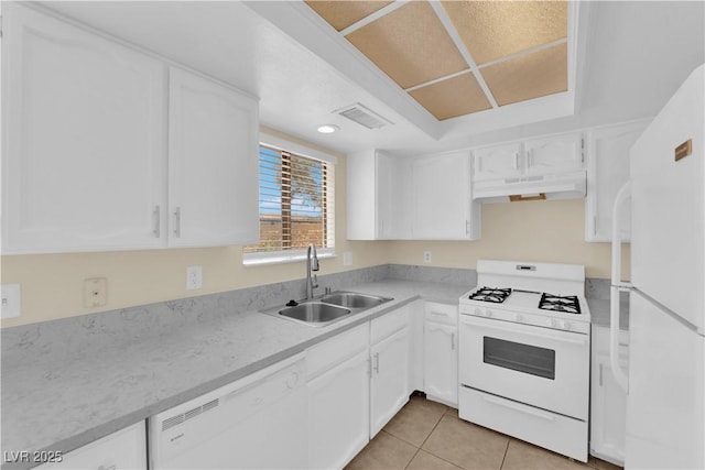 542 Grimsby Ave, Henderson, NV 89014 - kitchen with white appliances, under cabinet range hood, a sink, and white cabinetry