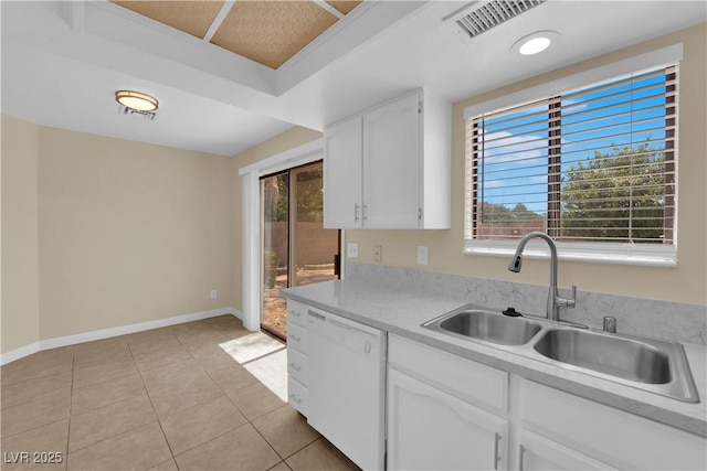 542 Grimsby Ave, Henderson, NV 89014 - kitchen featuring dishwasher, a sink, white cabinets, and healthy amount of natural light