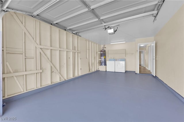 542 Grimsby Ave, Henderson, NV 89014 - garage featuring washing machine and dryer, strapped water heater, and a garage door opener