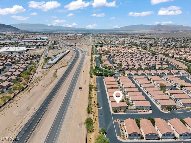 2596 Lazy Saddle Dr, Henderson, NV 89002 - view of property location with a mountainous background, a main thoroughfare, and nearby suburban area
