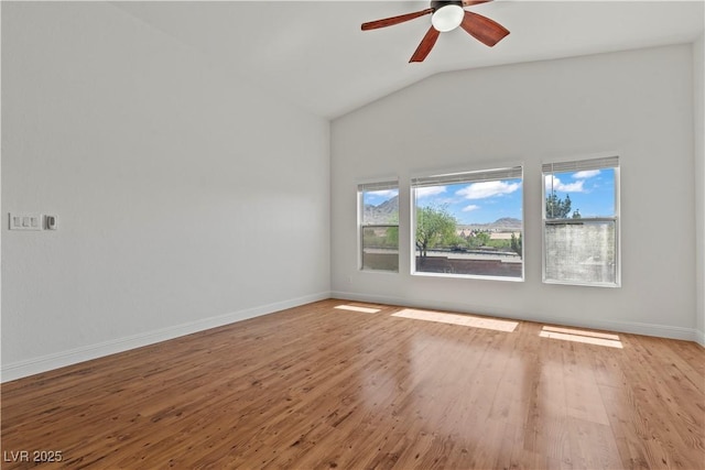 2596 Lazy Saddle Dr, Henderson, NV 89002 - unfurnished room featuring ceiling fan, light wood finished floors, baseboards, and vaulted ceiling