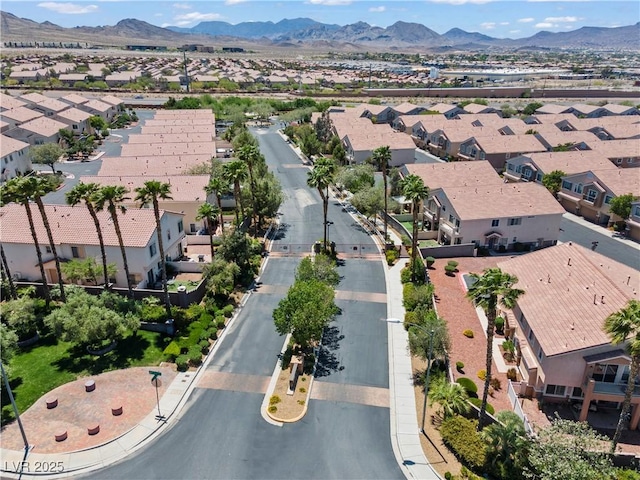 2596 Lazy Saddle Dr, Henderson, NV 89002 - aerial overview of property's location with nearby suburban area and a mountain backdrop