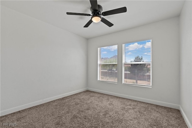 2596 Lazy Saddle Dr, Henderson, NV 89002 - spare room featuring carpet, baseboards, and a ceiling fan