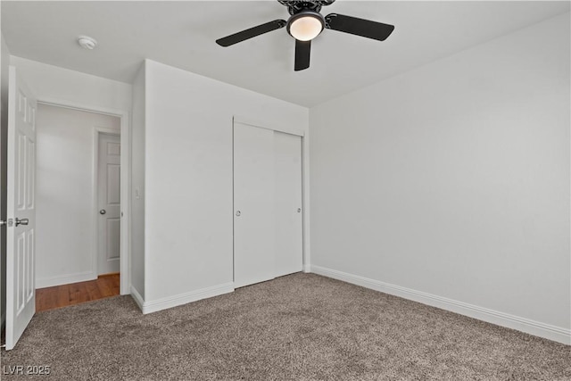2596 Lazy Saddle Dr, Henderson, NV 89002 - unfurnished bedroom featuring carpet floors, a closet, baseboards, and ceiling fan