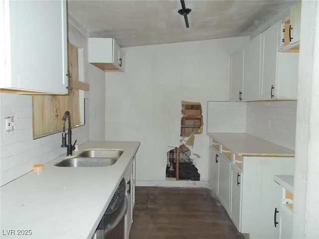 1912 Statz St, North Las Vegas, NV 89030 - kitchen featuring a sink, dishwasher, backsplash, and light countertops