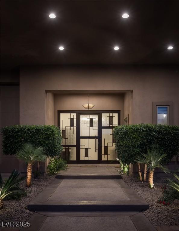 1683 Tangiers Dr, Henderson, NV 89012 - entrance to property with stucco siding