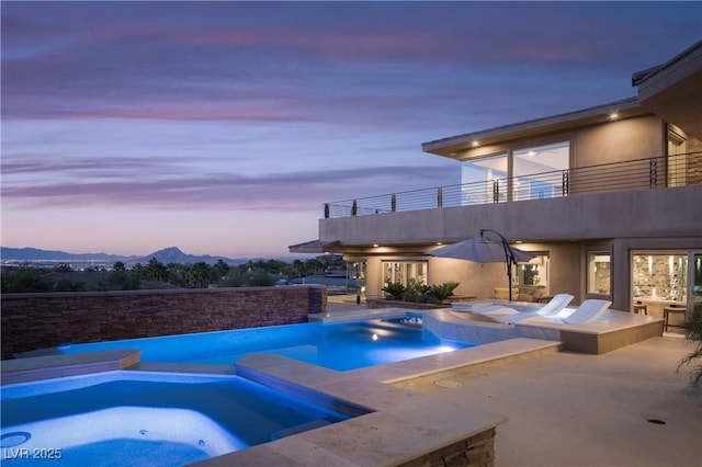 1683 Tangiers Dr, Henderson, NV 89012 - view of pool with a patio area, a mountain view, and a pool with connected hot tub