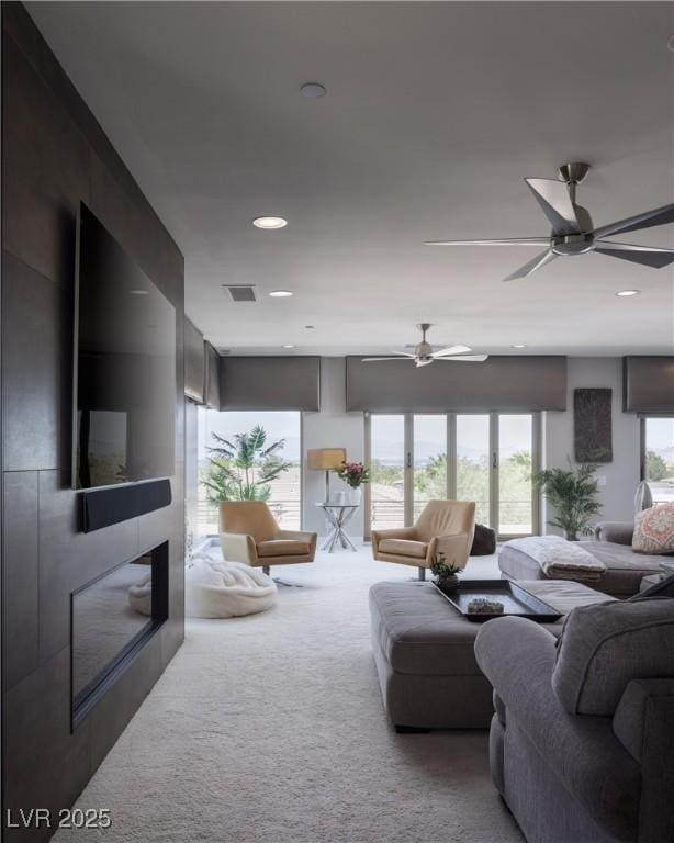 1683 Tangiers Dr, Henderson, NV 89012 - living area with carpet flooring, a ceiling fan, and recessed lighting