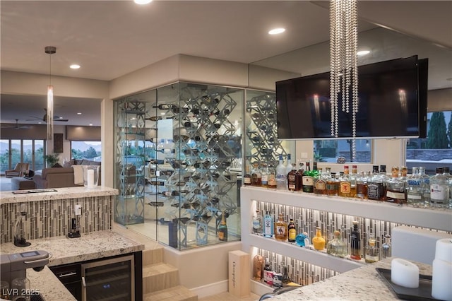 1683 Tangiers Dr, Henderson, NV 89012 - bathroom featuring wine cooler, ceiling fan, and recessed lighting
