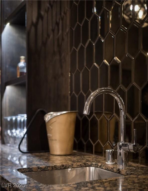 1683 Tangiers Dr, Henderson, NV 89012 - detailed view of a sink and dark stone countertops