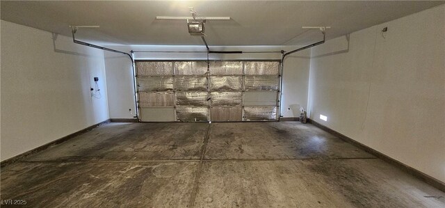3750 Morning Canyon St, Las Vegas, NV 89147 - garage with a garage door opener and baseboards