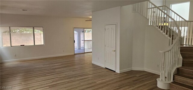 3750 Morning Canyon St, Las Vegas, NV 89147 - staircase with wood finished floors, baseboards, and a ceiling fan